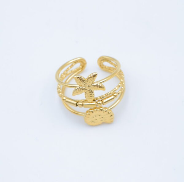Bague ajustable dorée avec étoile de mer et coquillage