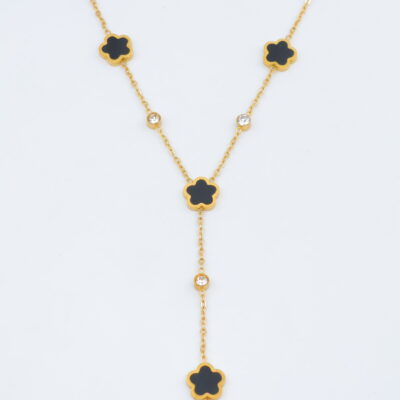 Collier doré pendentif long avec fleurs noires et cristaux